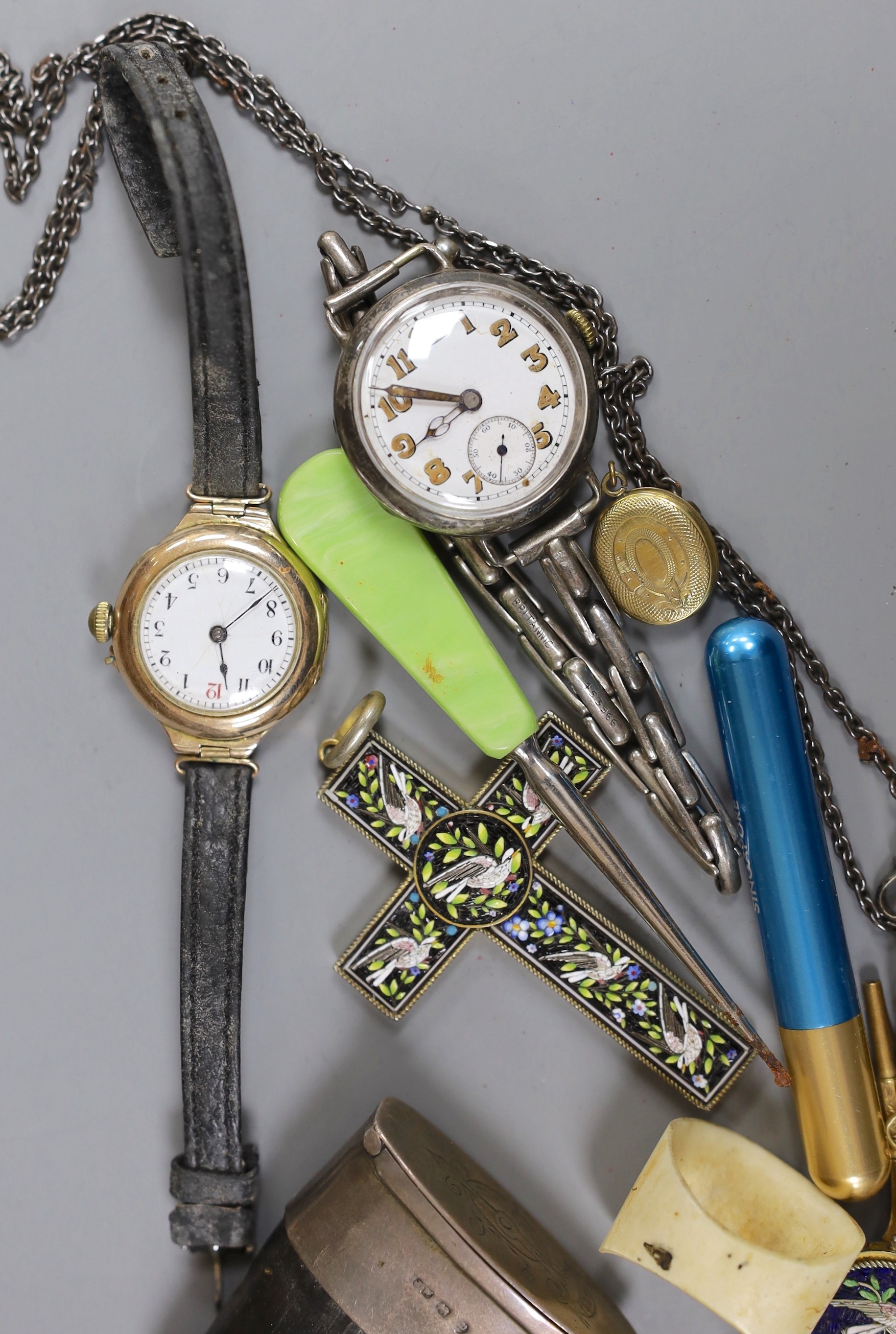 An early 20th century lady's 9ct gold wrist watch and sundry minor jewellery and accessories, including a German 950 white metal and enamel pill box.